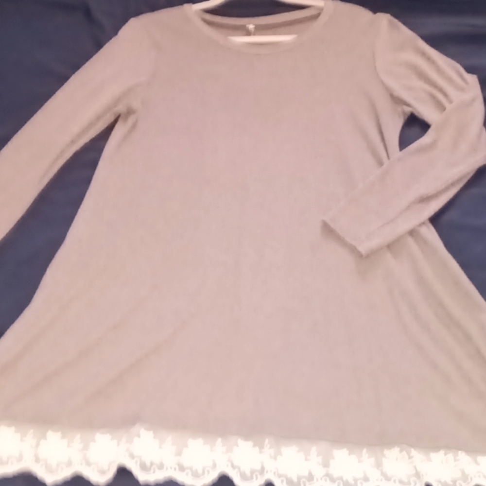 Gray dress with white trim on the bottom